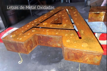 /trabajos/2026/07/16/letrero-metal-oxidado.jpg